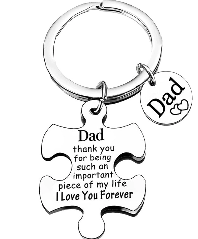 Keychain with puzzle piece and heart-shaped tag for Dad on a white background