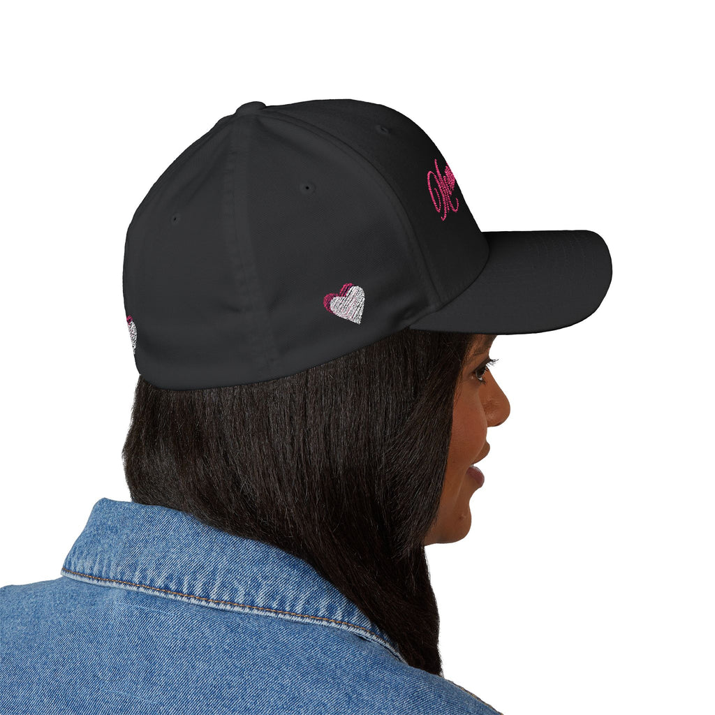 Person wearing a navy cap with red interior on a white background