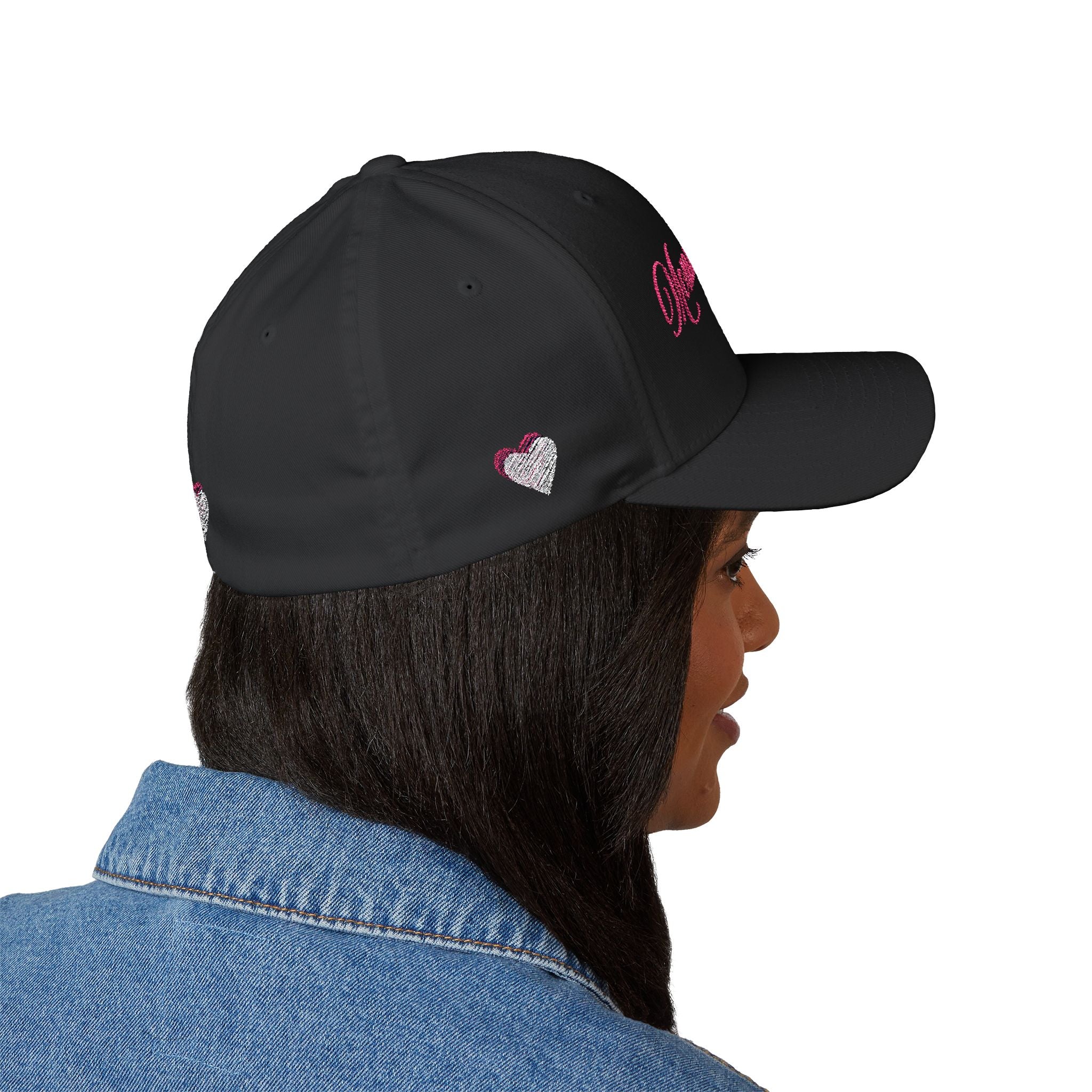 Person wearing a navy cap with red interior on a white background
