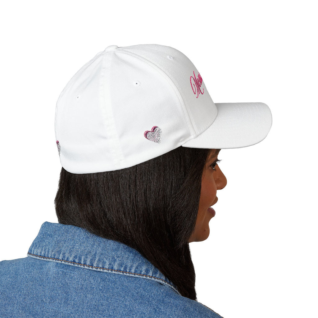 Person wearing a white cap with a logo on a white background