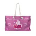 Pink tote bag with 'Momma Bear Weekend Bag' text and graphics on a white background