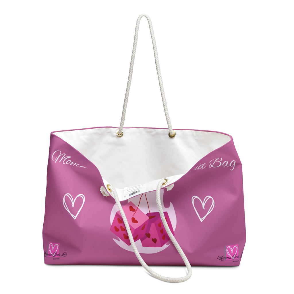 Pink tote bag with white hearts and text on a white background