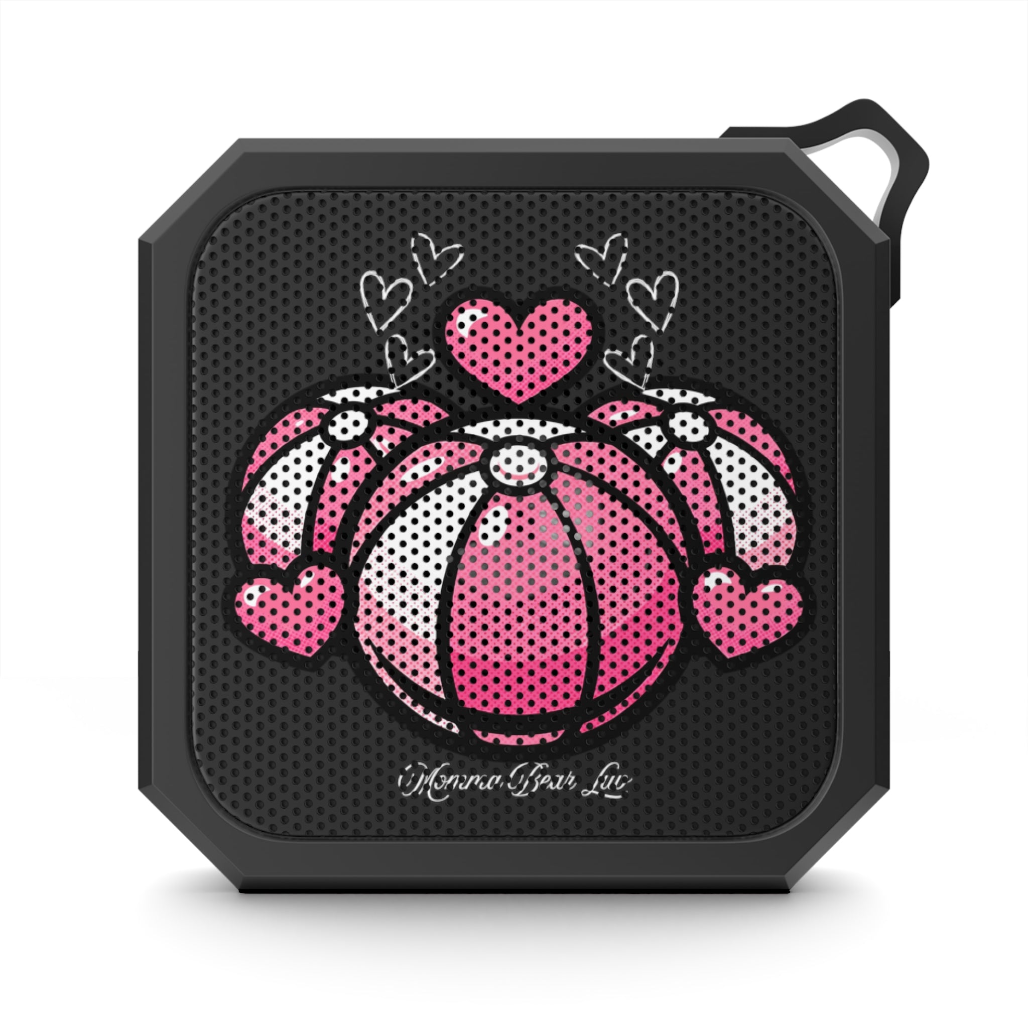 Black portable speaker with pink and white beach balls and hearts design.
