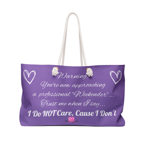 Purple tote bag with humorous text and white hearts on a white background