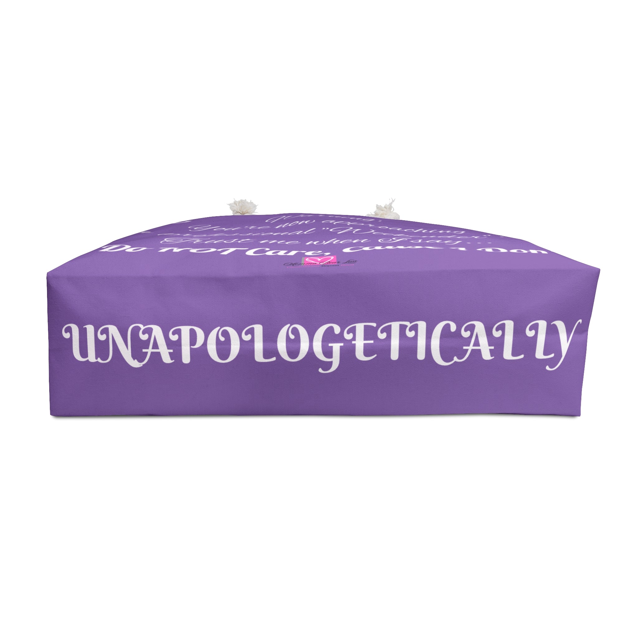 Purple cushion with white text on a white background