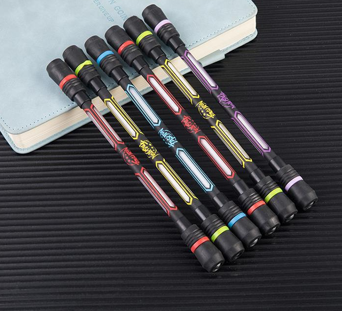 Set of colorful pens with branded names on a textured surface